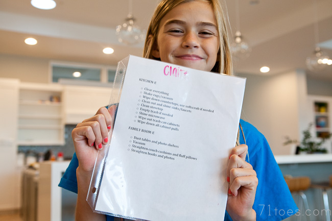 Claire smiling with her Saturday job list