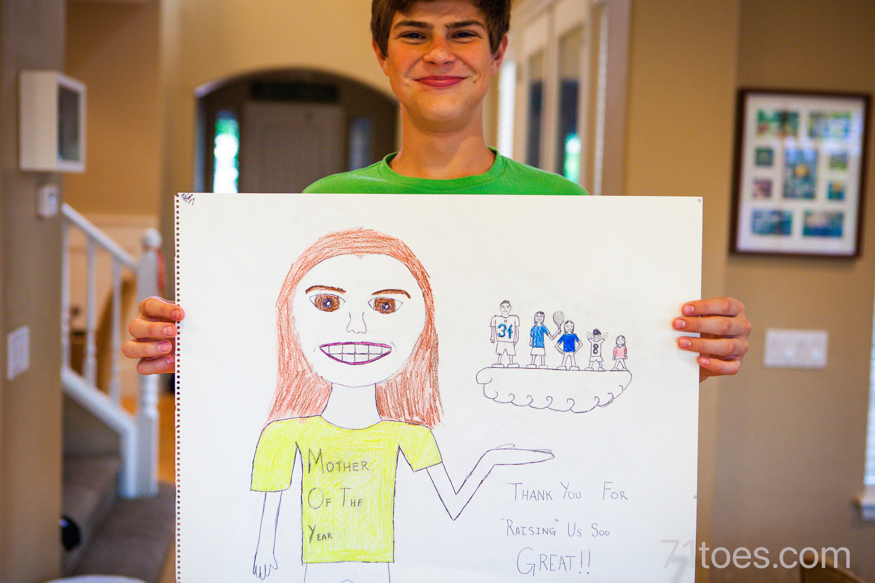 Max with a drawing he drew for Mother's Day