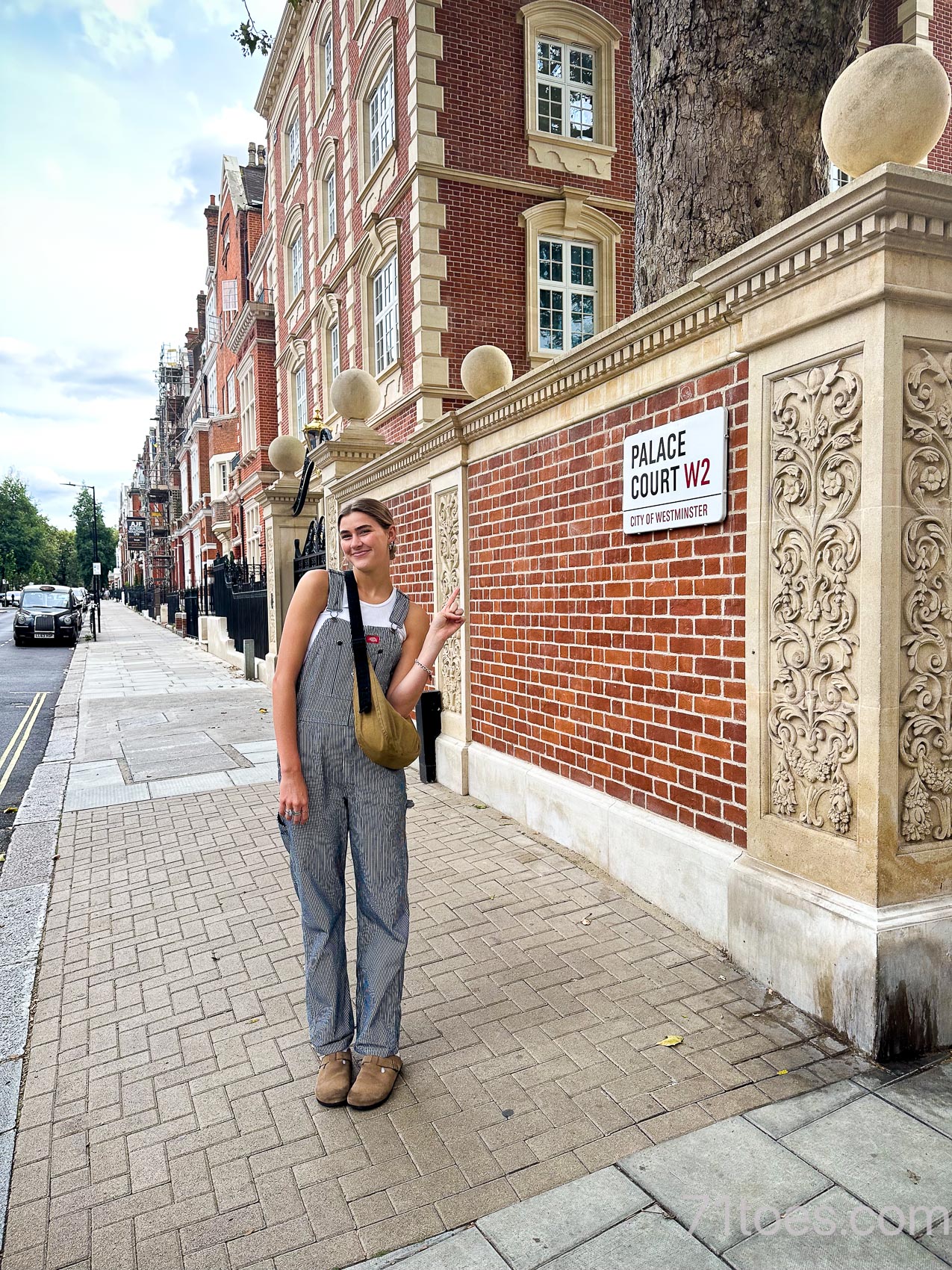 Claire at her street in London