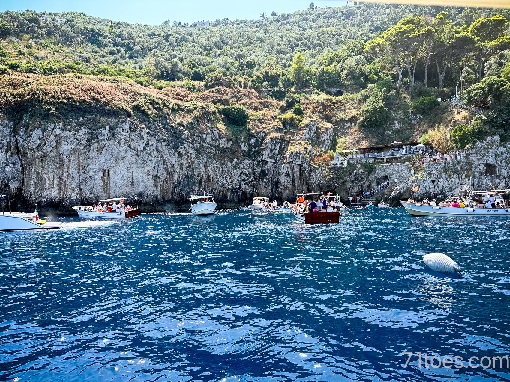 the place on the Amalfi Coast where you can go in a boat to explore the Blue Grotto