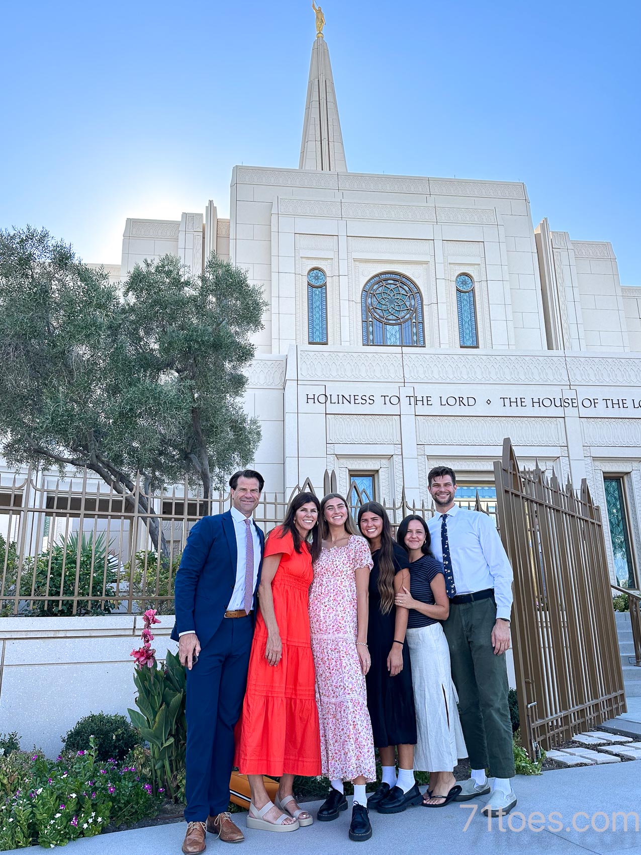 The family minus Elle and Carson at the temple with Claire.