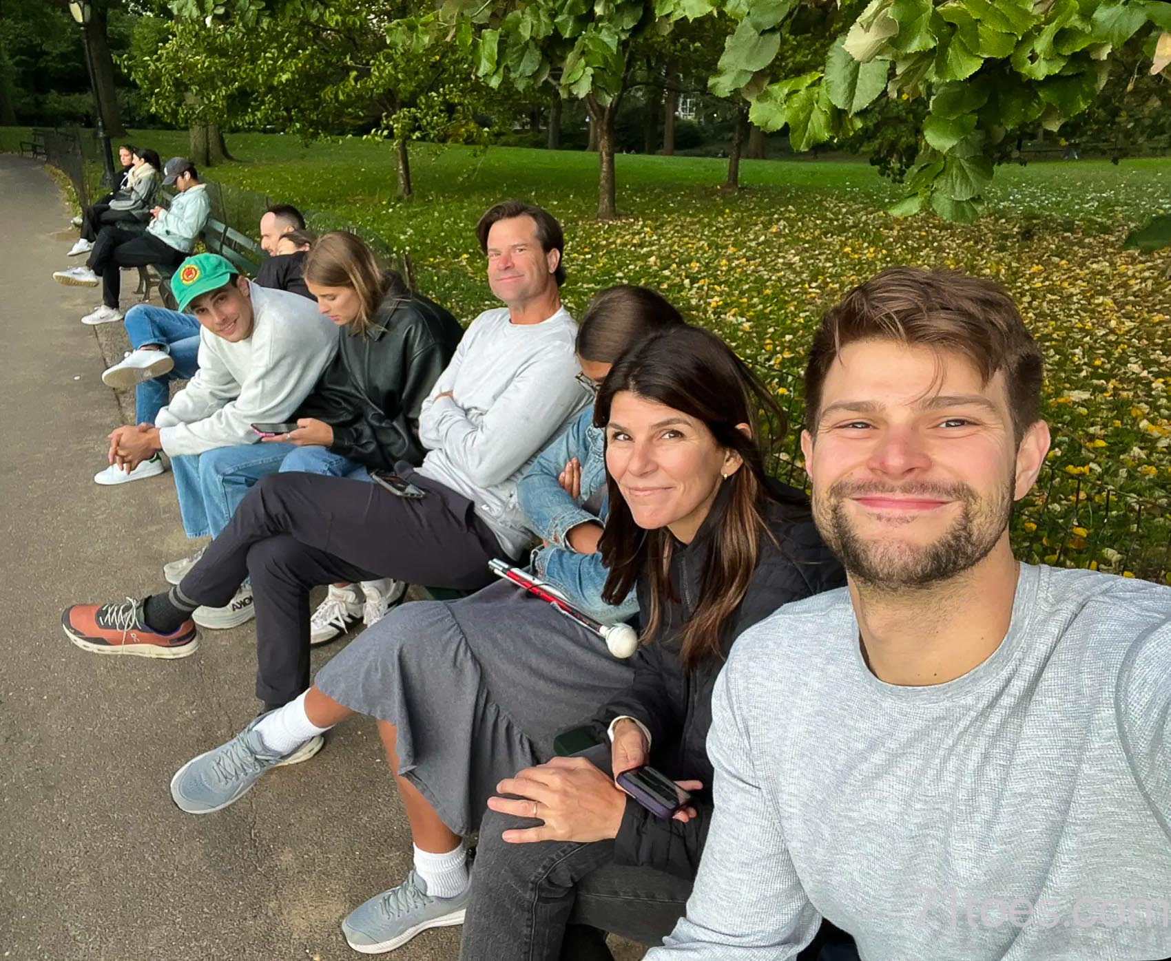 Shawni, David, Max and others sitting in Central park