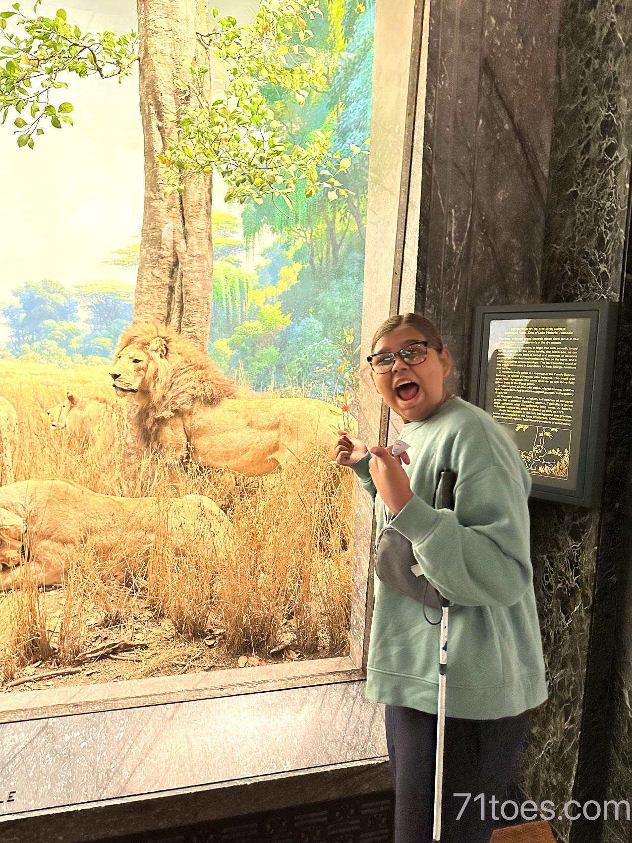 Lucy with the lion at the Natural History Museum